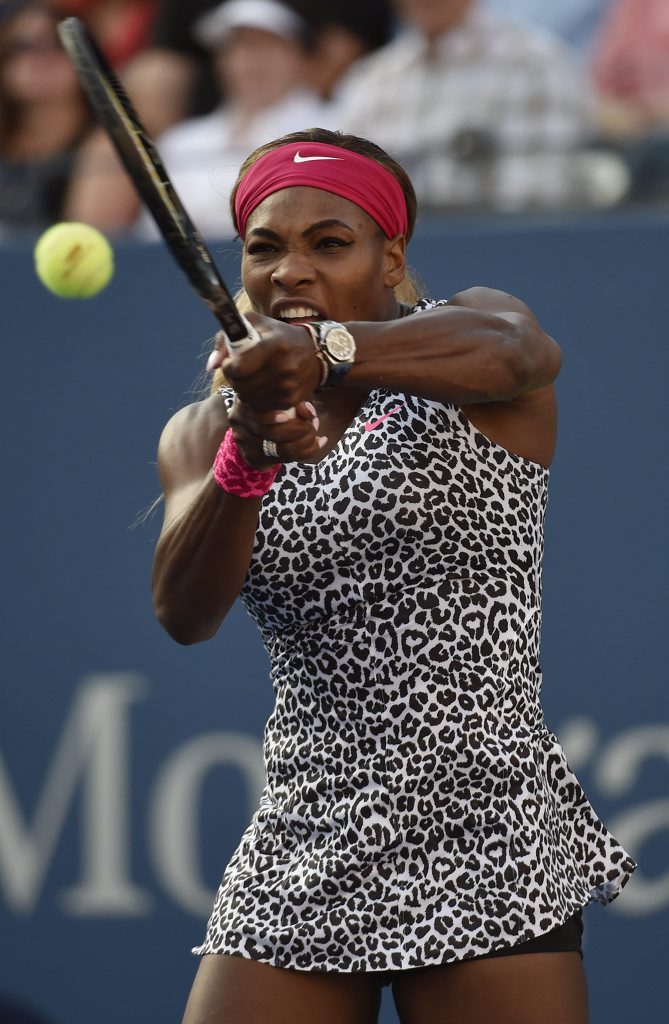 Serena Williams of the US hits a return to Caroline Wozniacki of Denmark. Serena Williams of the US hits a return to Caroline Wozniacki of Denmark.