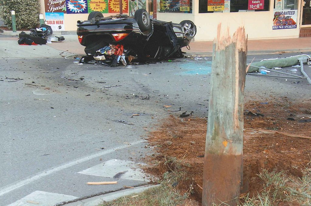 MIRACLE ESCAPE: Two people were badly hurt after Dylan John Hempelman crashed his car after driving at more than twice the speed limit in the middle of Lowood. MIRACLE ESCAPE: Two people were badly hurt after Dylan John Hempelman crashed his car after driving at more than twice the speed limit in the middle of Lowood.