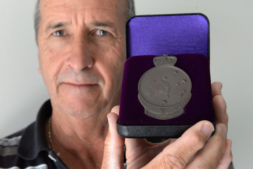 ROLL OF HONOUR: Graeme Rodgers holds his great uncle Thomas Wintle's First World War medal. Thomas Wintle's name has been added to the Australian War Memorial in Canberra. Photo: Mike Knott / NewsMail ROLL OF HONOUR: Graeme Rodgers holds his great uncle Thomas Wintle's First World War medal. Thomas Wintle's name has been added to the Australian War Memorial in Canberra. Photo: Mike Knott / NewsMail