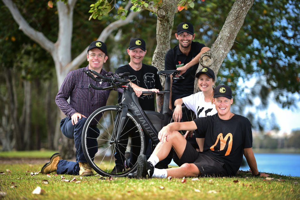 Triathlete Casey Munro of Mooloolaba(front right) readies himself for this weekend's 70.3 event with support crew (left) John Smith, Nathan Shearer, Jason Crowther and Bernadette Bridger. Photo: Iain Curry / Sunshine Coast Daily Triathlete Casey Munro of Mooloolaba(front right) readies himself for this weekend's 70.3 event with support crew (left) John Smith, Nathan Shearer, Jason Crowther and Bernadette Bridger. Photo: Iain Curry / Sunshine Coast Daily