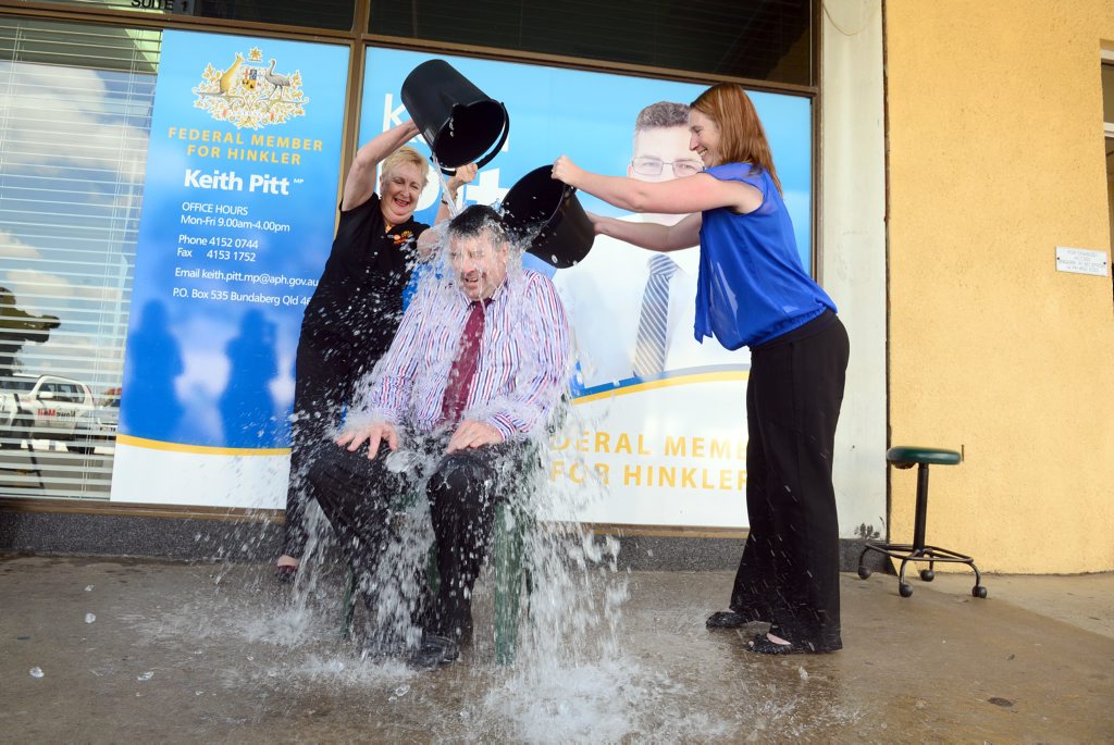 ICE BUCKET: Member for Hinkler Keith Pitt takes the ice bucket challenge and 4BU's Trish Mears and the NewsMail's Liz Carson gladly step in to help. Photo: Max Fleet / NewsMail ICE BUCKET: Member for Hinkler Keith Pitt takes the ice bucket challenge and 4BU's Trish Mears and the NewsMail's Liz Carson gladly step in to help. Photo: Max Fleet / NewsMail