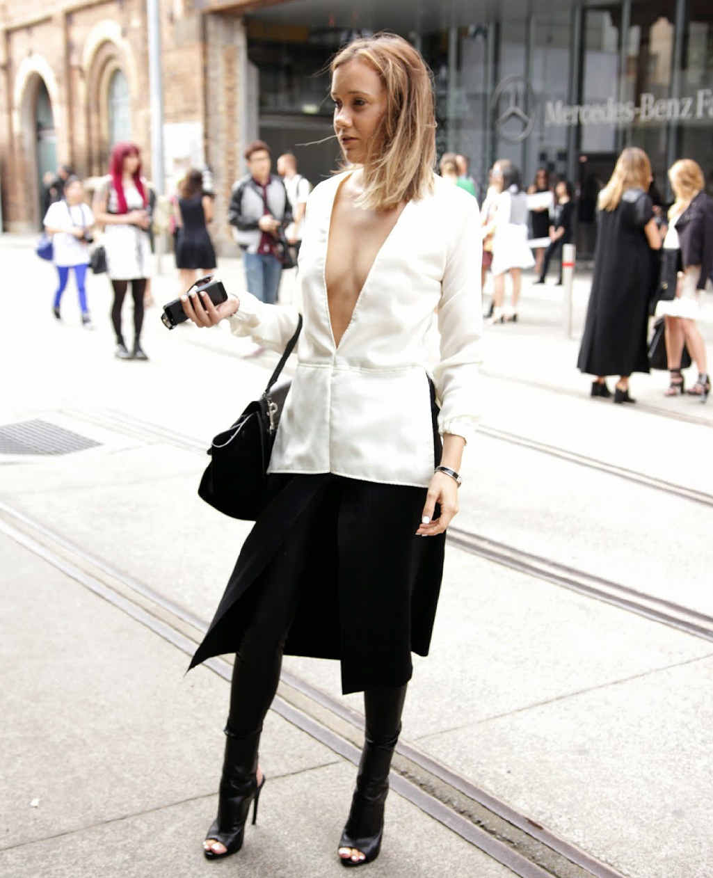 FREESTYLE FASHIONISTA: Gabby poses in the same outfit that was featured on Elle Australia. Inset: Gabby takes a quick snap at Mercedes-Benz Fashion Week Australia. FREESTYLE FASHIONISTA: Gabby poses in the same outfit that was featured on Elle Australia. Inset: Gabby takes a quick snap at Mercedes-Benz Fashion Week Australia.