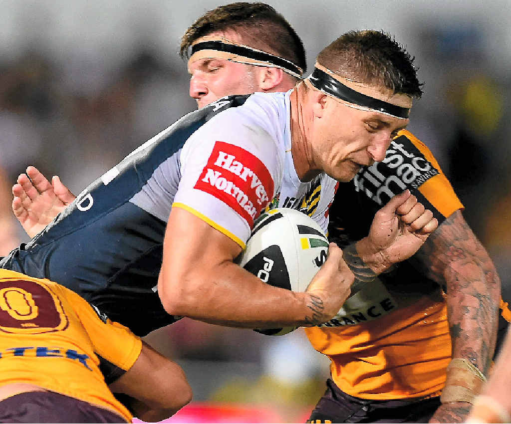 SIMS’ SINS: Cowboy Tariq Sims is tackled by the Brisbane Broncos defence at 1300SMILES Stadium on Saturday. Sims has been hit with a grade-three charge for a shoulder charge on Justin Hodges during the match. SIMS’ SINS: Cowboy Tariq Sims is tackled by the Brisbane Broncos defence at 1300SMILES Stadium on Saturday. Sims has been hit with a grade-three charge for a shoulder charge on Justin Hodges during the match.