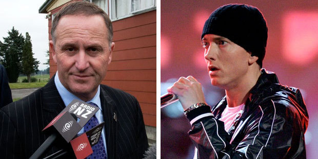 Prime Minister John Key and rapper Eminem. Photo / AFP; Getty Images Prime Minister John Key and rapper Eminem. Photo / AFP; Getty Images