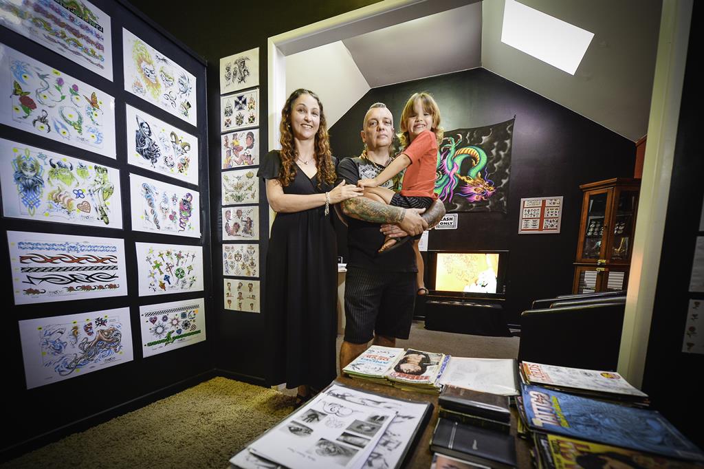 Agnes Water Tattoo Studio owners Sharon and Ian Walker with daughter Gage, 4. Agnes Water Tattoo Studio owners Sharon and Ian Walker with daughter Gage, 4.