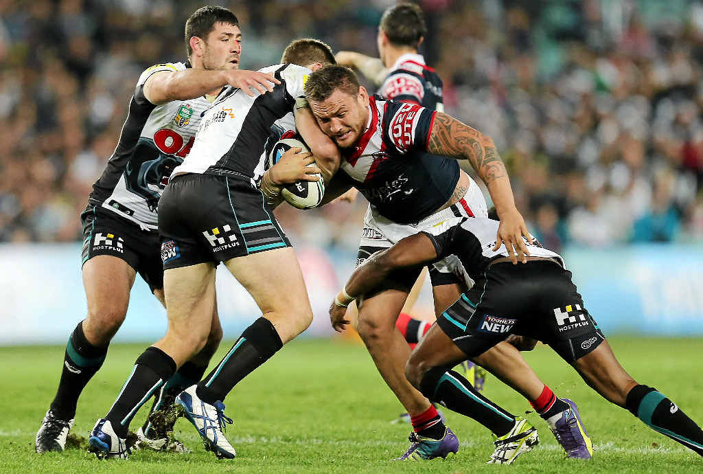 GOOD KARMA: Roosters prop Jared Waerea-Hargreaves is wrapped up by the Panthers defence in last week’s qualifying final. Waerea-Hargreaves was fortunate to escape a charge from the judiciary after the game. GOOD KARMA: Roosters prop Jared Waerea-Hargreaves is wrapped up by the Panthers defence in last week’s qualifying final. Waerea-Hargreaves was fortunate to escape a charge from the judiciary after the game.