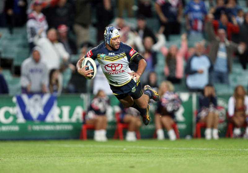 Johnathan Thurston dives for a no-try during the NRL semi-final between the Sydney Roosters and the North Queensland Cowboys at Allianz Stadium, in Sydney, Friday, Sept. 19, 2014. Johnathan Thurston dives for a no-try during the NRL semi-final between the Sydney Roosters and the North Queensland Cowboys at Allianz Stadium, in Sydney, Friday, Sept. 19, 2014.