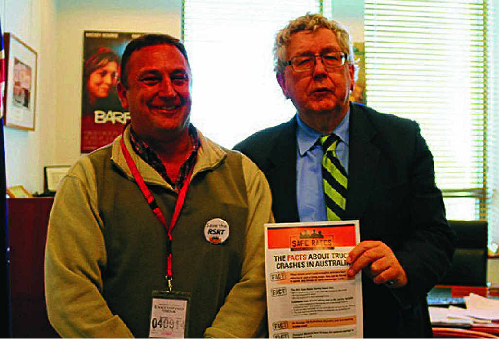 KEEP IT: Long distance driver Eric Pickering delivers the Safe Rates message to MP Laurie Ferguson. KEEP IT: Long distance driver Eric Pickering delivers the Safe Rates message to MP Laurie Ferguson.