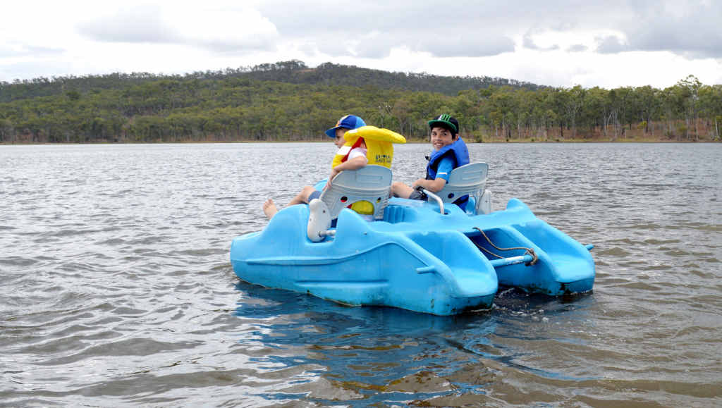 COOL WATERS: Alexander Connolly and Nicholas Briggs take to the water during Silver Wattle Day at the Mount Morgan Dam. COOL WATERS: Alexander Connolly and Nicholas Briggs take to the water during Silver Wattle Day at the Mount Morgan Dam.