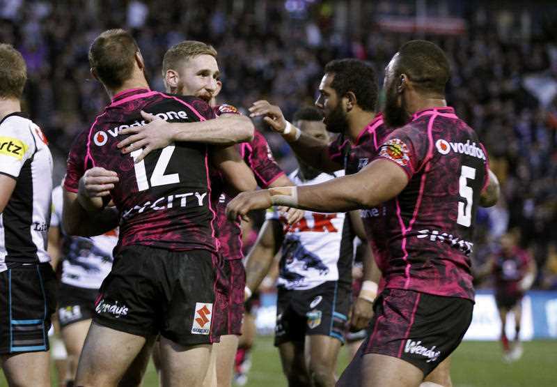 Warriors celebrate after Simon Mannering's try during the round 16 NRL match between the NZ Warriors and the Penrith Panthers at Mt Smart Stadium in Auckland, Sunday, June 29, 2014. (AAP Image/Action Photographics, Shane Wenzlick) Warriors celebrate after Simon Mannering's try during the round 16 NRL match between the NZ Warriors and the Penrith Panthers at Mt Smart Stadium in Auckland, Sunday, June 29, 2014. (AAP Image/Action Photographics, Shane Wenzlick)
