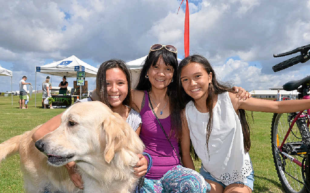 GREAT FOR FAMILIES: Chloe, Teresa and Larnie Ives with Buddy at the new fitness-themed park at Bells Reach. GREAT FOR FAMILIES: Chloe, Teresa and Larnie Ives with Buddy at the new fitness-themed park at Bells Reach.