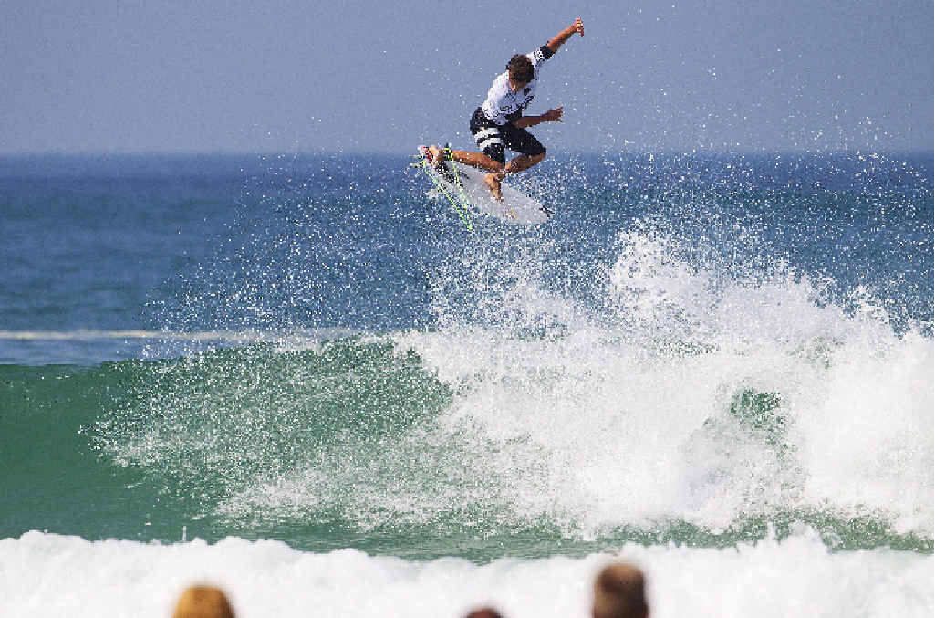 BACK IN BUSINESS: Coolum Beach’s Julian Wilson gets some air in his round one heat at the Quiksilver Pro France, advancing in first place after scoring 8.50 and 8.27, out of 10, on his two scored rides. BACK IN BUSINESS: Coolum Beach’s Julian Wilson gets some air in his round one heat at the Quiksilver Pro France, advancing in first place after scoring 8.50 and 8.27, out of 10, on his two scored rides.