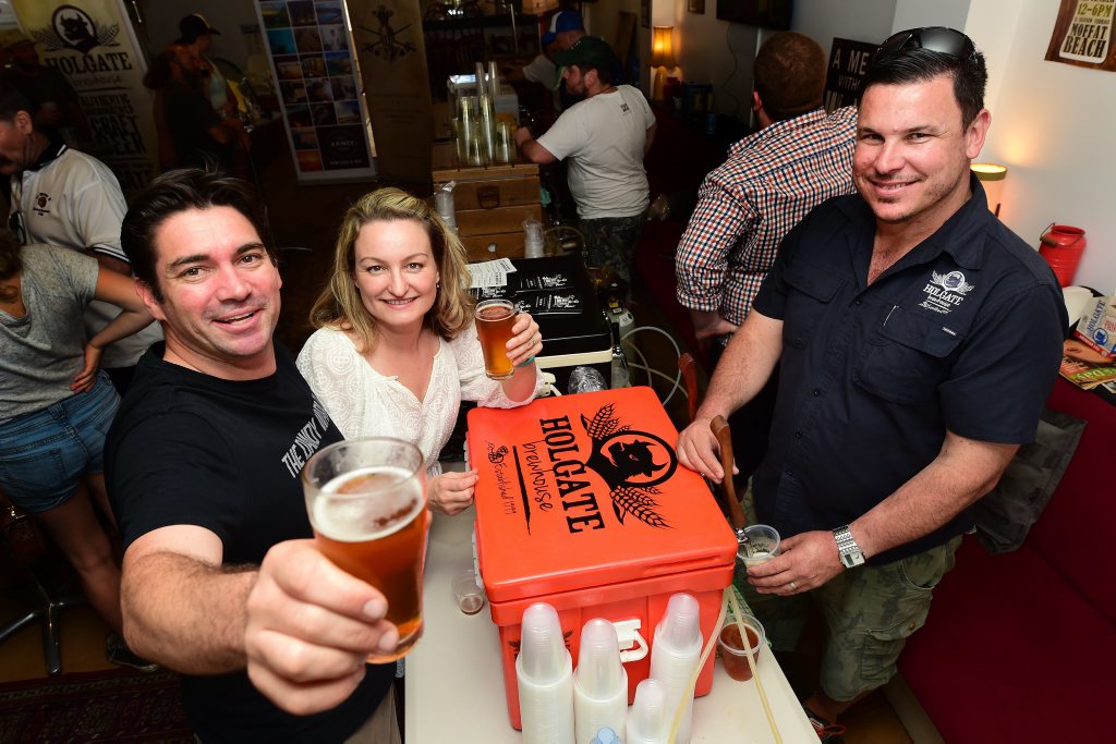 Matt and Sharynne Wilson are poured glasses of beer from Holgate Brewhouse by Luke Phillips at the Blackwater Boutique Beer Fest at Blackwater Trading Co, Moffat Beach. Photo: Iain Curry / Sunshine Coast Daily Matt and Sharynne Wilson are poured glasses of beer from Holgate Brewhouse by Luke Phillips at the Blackwater Boutique Beer Fest at Blackwater Trading Co, Moffat Beach. Photo: Iain Curry / Sunshine Coast Daily