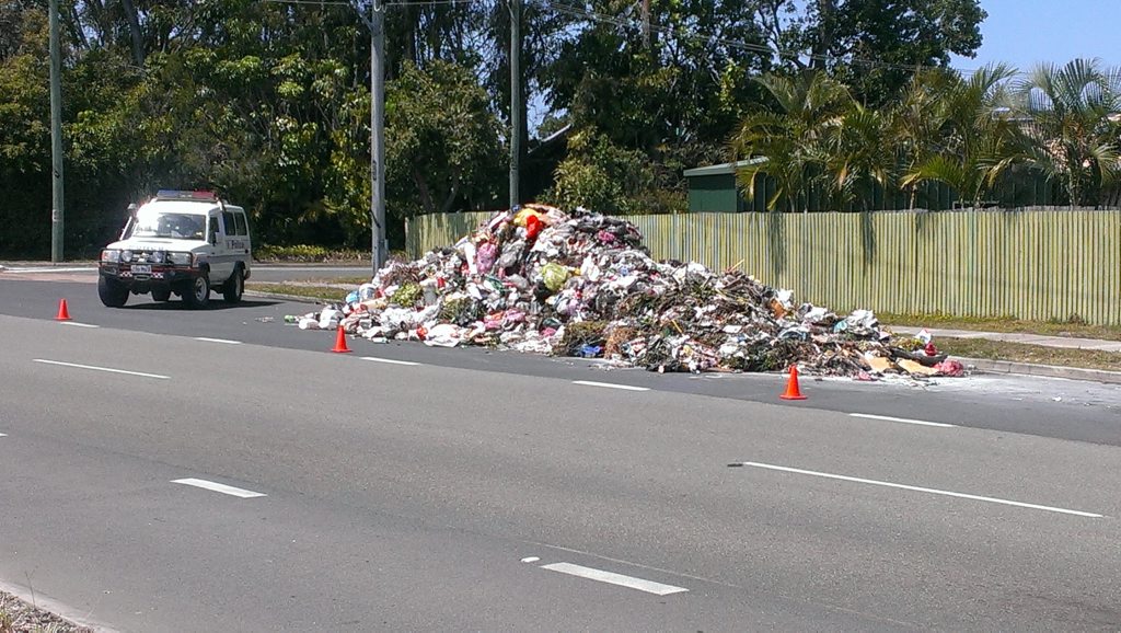 A large pile of garbage on Benabrow Ave, Bellara, following a garbage truck fire. Photo Contributed. A large pile of garbage on Benabrow Ave, Bellara, following a garbage truck fire. Photo Contributed.