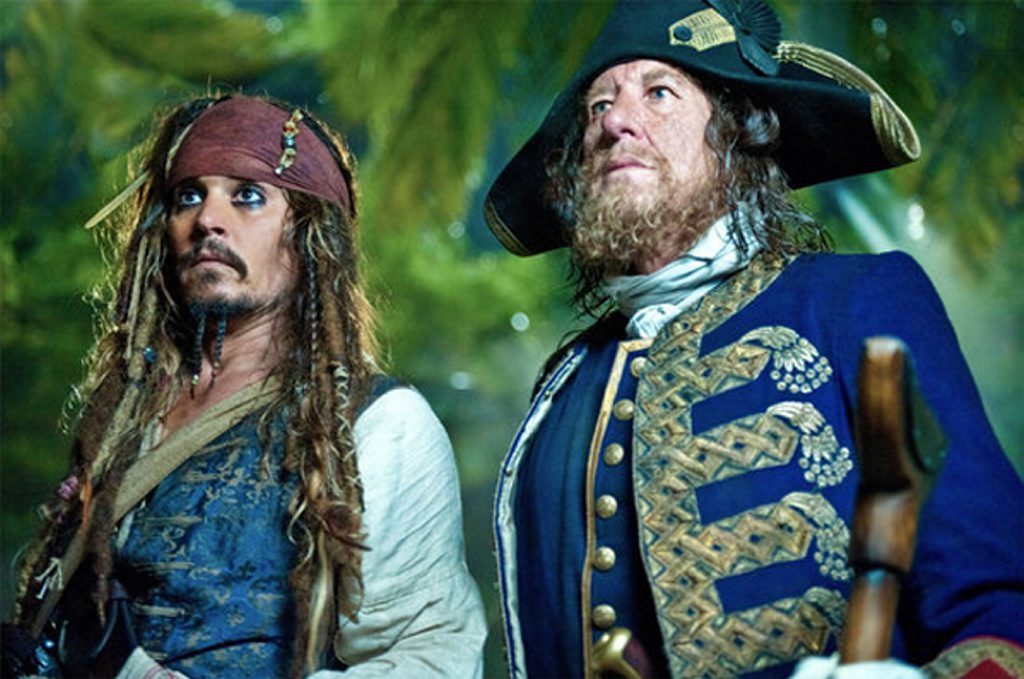 Johnny Depp and Geoffrey Rush in a scene from Pirates of the Caribbean: On Stranger Tides. Johnny Depp and Geoffrey Rush in a scene from Pirates of the Caribbean: On Stranger Tides.