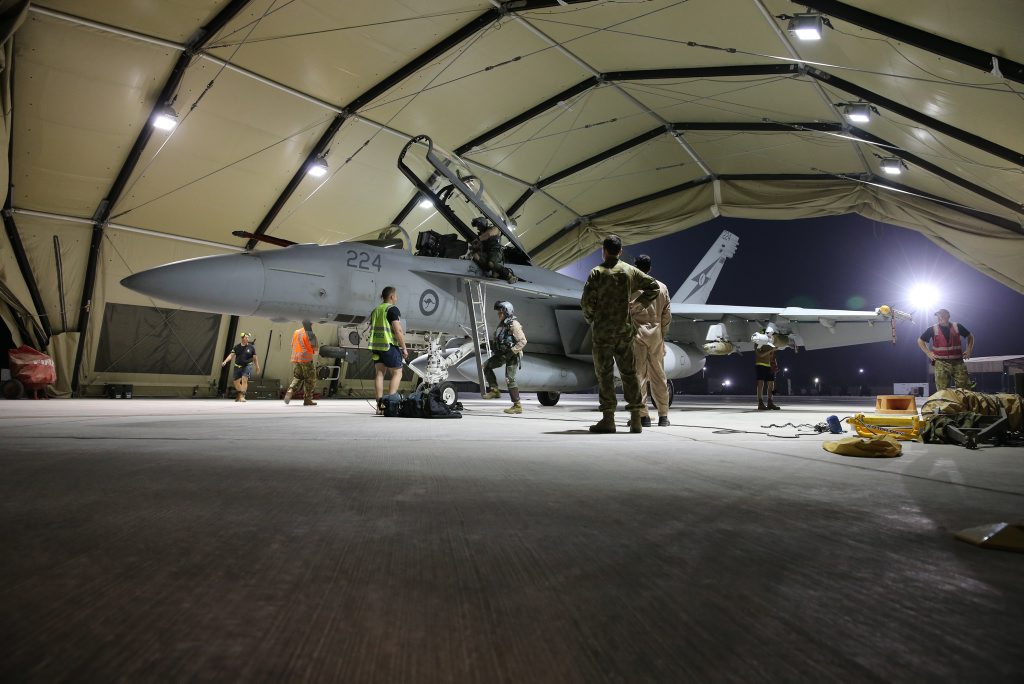 EYE IN THE SKY: RAAF aircrew disembark after completing their first mission over Iraq. EYE IN THE SKY: RAAF aircrew disembark after completing their first mission over Iraq.