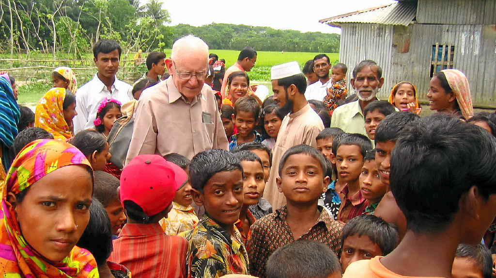 HUMBLE AND AWE-INSPIRING: After military service and a successful career in retailing, Fred Hyde was drawn to southern Asia, where he looked after an orphanage-farm run by an Australian aid agency before starting CO-ID. Fred is pictured here with families from a CO-ID school in Bangladesh. HUMBLE AND AWE-INSPIRING: After military service and a successful career in retailing, Fred Hyde was drawn to southern Asia, where he looked after an orphanage-farm run by an Australian aid agency before starting CO-ID. Fred is pictured here with families from a CO-ID school in Bangladesh.
