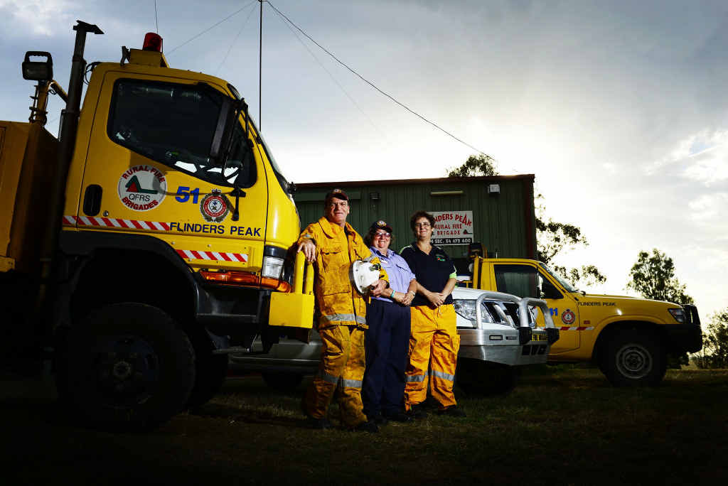 DEDICATED MEMBERS: Flinders Peak Rural Fire Brigade firefighter Ken McKellar, first officer Robyn Outen-Scott and fourth officer Melanie Cumner prepare for the 60th anniversary celebrations this weekend. DEDICATED MEMBERS: Flinders Peak Rural Fire Brigade firefighter Ken McKellar, first officer Robyn Outen-Scott and fourth officer Melanie Cumner prepare for the 60th anniversary celebrations this weekend.
