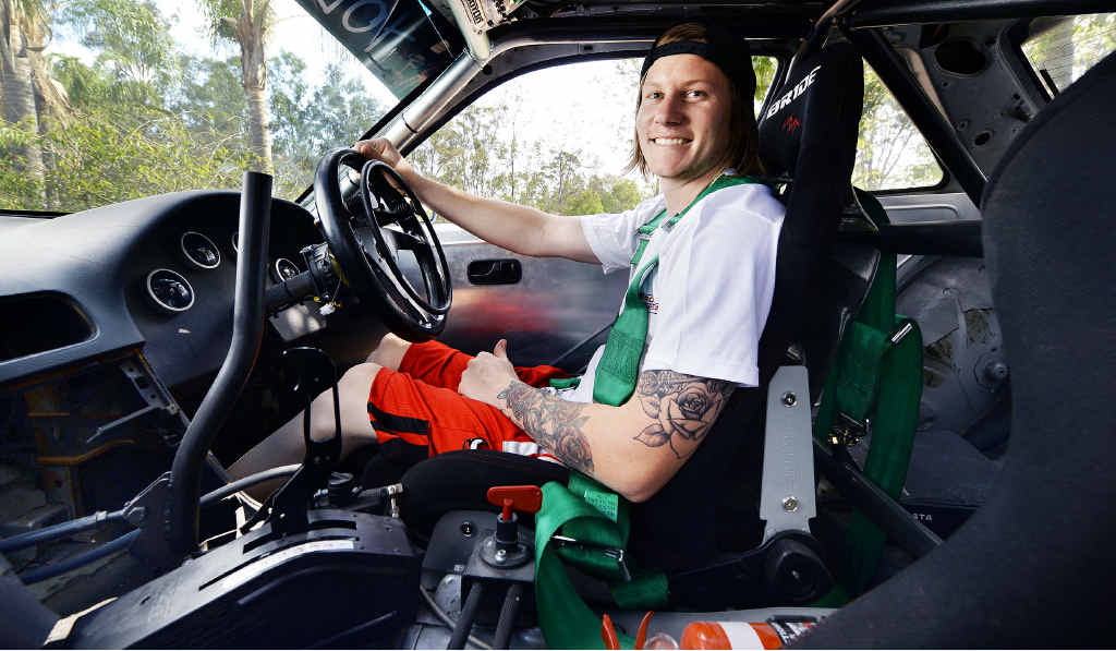 AT THE WHEEL: Tyson Litfin became a paraplegic after an accident in 2012 but can now race again after building a specially modified car. AT THE WHEEL: Tyson Litfin became a paraplegic after an accident in 2012 but can now race again after building a specially modified car.