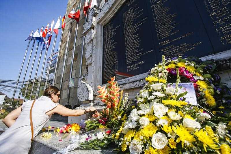 Relatives and survivors of the 2002 Bali bombing victims gather in front of the 2002 Bali Bombing memorial Monument during the 12th anniversary in Kuta, Bali, Indonesia, 12 October 2014. The 12 October 2002 terrorist attacks in Kuta claimed the lives of 202 people, including 88 Australians. Relatives and survivors of the 2002 Bali bombing victims gather in front of the 2002 Bali Bombing memorial Monument during the 12th anniversary in Kuta, Bali, Indonesia, 12 October 2014. The 12 October 2002 terrorist attacks in Kuta claimed the lives of 202 people, including 88 Australians.