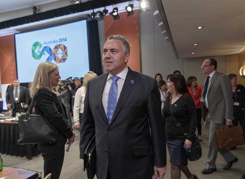 Australia's Treasurer Joe Hockey, chair of the Group of Twenty, center, joins economic leaders at the International Monetary Fund and World Bank meetings in Washington, Friday, Oct. 10, 2014. Australia's Treasurer Joe Hockey, chair of the Group of Twenty, center, joins economic leaders at the International Monetary Fund and World Bank meetings in Washington, Friday, Oct. 10, 2014.