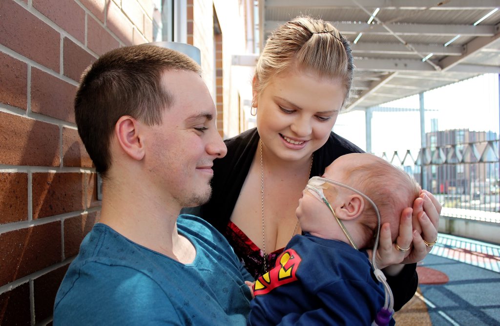 Taleah and Joel Blayney hold their son Kurt. Taleah and Joel Blayney hold their son Kurt.