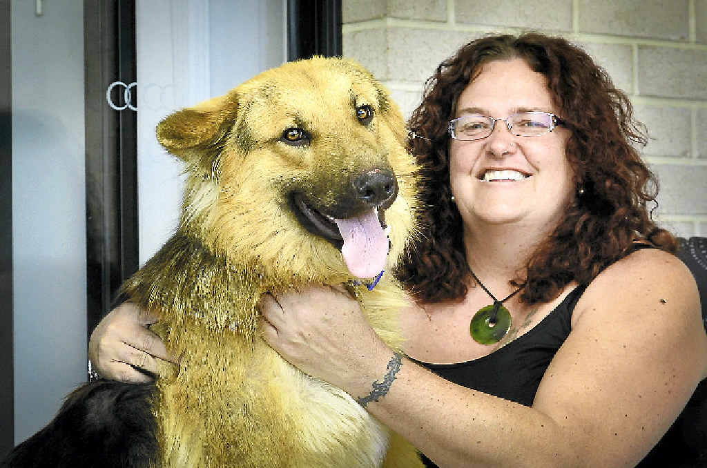 REUNITED: Banesse Atkinson is thankful to have her german shepherd Rex back after he was lost for two months. REUNITED: Banesse Atkinson is thankful to have her german shepherd Rex back after he was lost for two months.