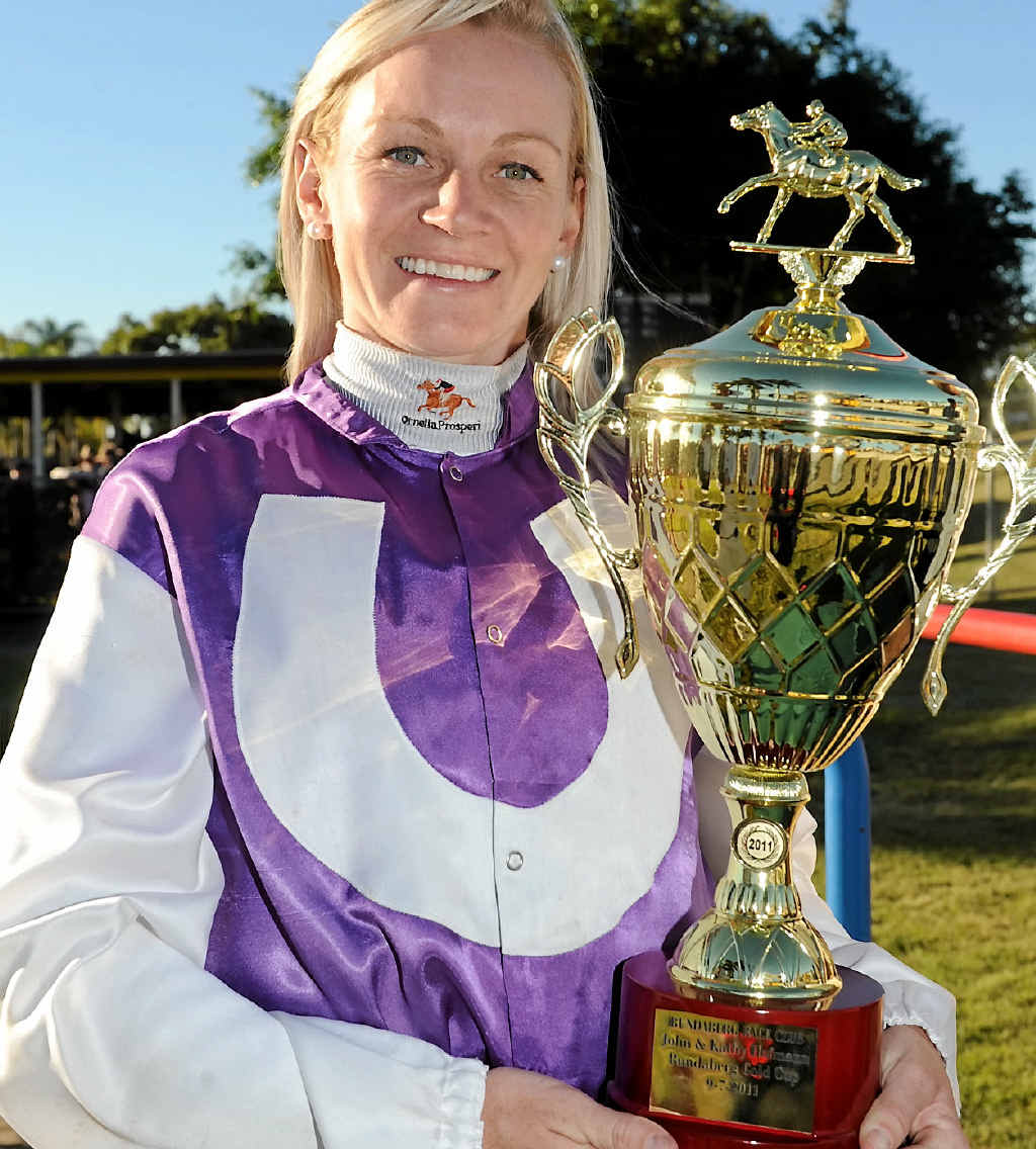 Tracy O’Hara with the Bundaberg Gold Cup in 2011 Tracy O’Hara with the Bundaberg Gold Cup in 2011