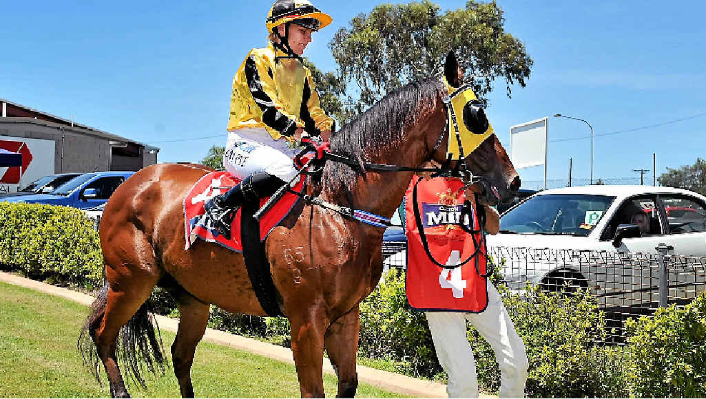 Carly-Mae Pye returns to scale on Rhino after a win at the Gladstone Turf Club. Carly-Mae Pye returns to scale on Rhino after a win at the Gladstone Turf Club.