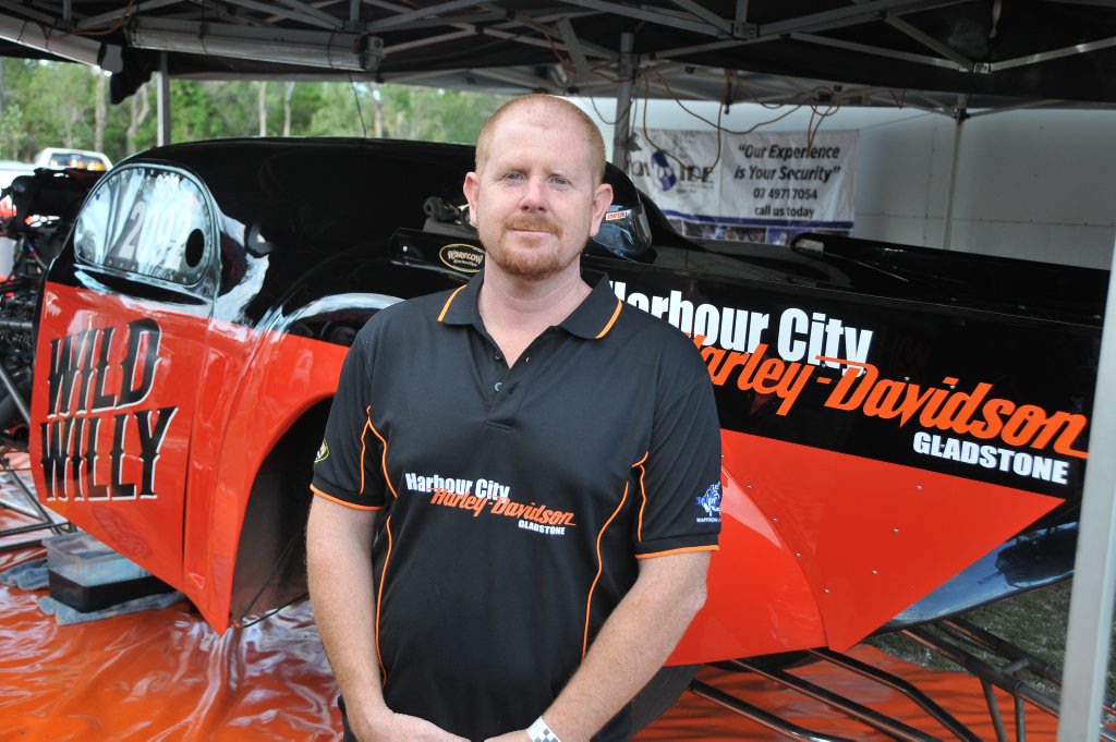Mark Harris and his drag car named Wild Willy, a car he worked on for eight months before he could race it. Mark Harris and his drag car named Wild Willy, a car he worked on for eight months before he could race it.