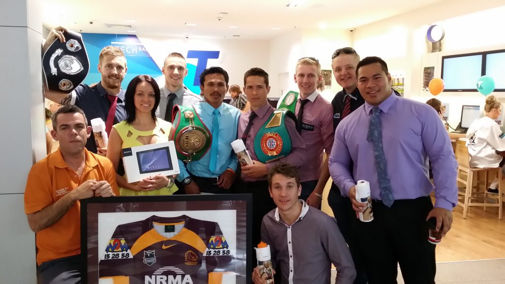 Telstra Southern Queensland's Scott Mullaly and Queensland champion boxers present Braxton's aunt Nichi Morrin with the prizes to be auctioned at the Fight Night fundraiser at Smithy's gym on October 31 Telstra Southern Queensland's Scott Mullaly and Queensland champion boxers present Braxton's aunt Nichi Morrin with the prizes to be auctioned at the Fight Night fundraiser at Smithy's gym on October 31