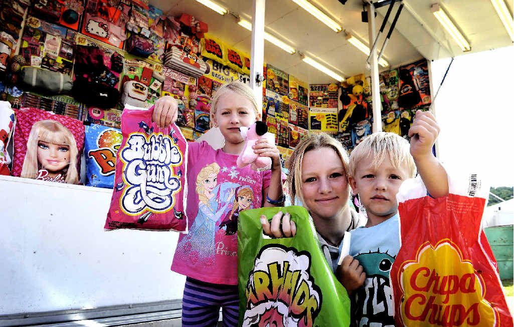 Mackenzie Murphy, 6, Natahlia Murphy, 15, and Cohen Dietrich, 3, all of Casino, celebrate their take in the showbags. Mackenzie Murphy, 6, Natahlia Murphy, 15, and Cohen Dietrich, 3, all of Casino, celebrate their take in the showbags.