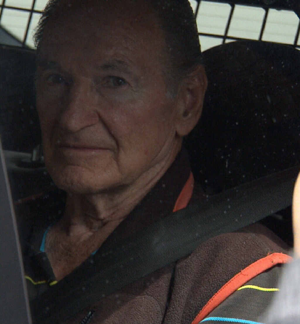 IN CUSTODY: Vince O’Dempsey in the back of a police vehicle heading into the Brisbane City watchhouse ahead of his court appearance today. Photo - Channel 9. IN CUSTODY: Vince O’Dempsey in the back of a police vehicle heading into the Brisbane City watchhouse ahead of his court appearance today. Photo - Channel 9.