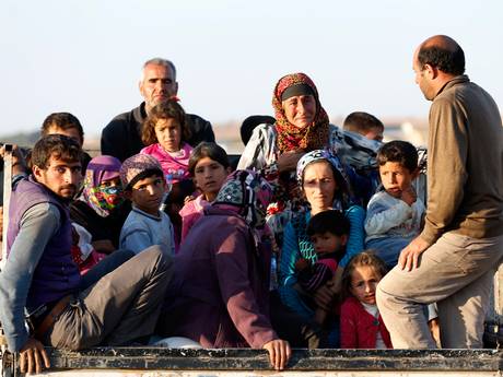 Syrian Kurdish refugees after crossing into Turkey from Kobani. Syrian Kurdish refugees after crossing into Turkey from Kobani.