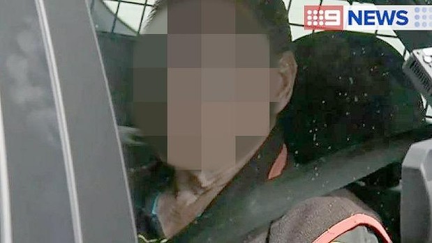 Vincent O'Dempsey is taken into custody. Photo: Nine News
Vincent O'Dempsey is taken into custody. Photo: Nine News