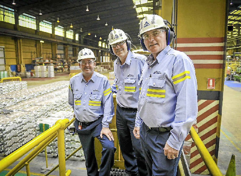 SAFETY MILESTONE: Boyne Smelters Ltd manager metal products Nigel Mullen, general manager operations Joe Rea and operations manager Kevin Taylor in the metal products area of the smelter. SAFETY MILESTONE: Boyne Smelters Ltd manager metal products Nigel Mullen, general manager operations Joe Rea and operations manager Kevin Taylor in the metal products area of the smelter.