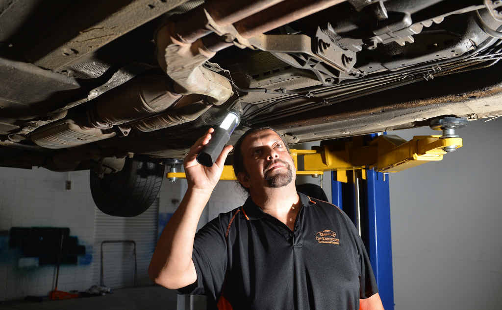 WORRYING: Forest Glen mechanic Frank Melendez has warned car owners of the high cost of repairs at franchised dealerships. WORRYING: Forest Glen mechanic Frank Melendez has warned car owners of the high cost of repairs at franchised dealerships.