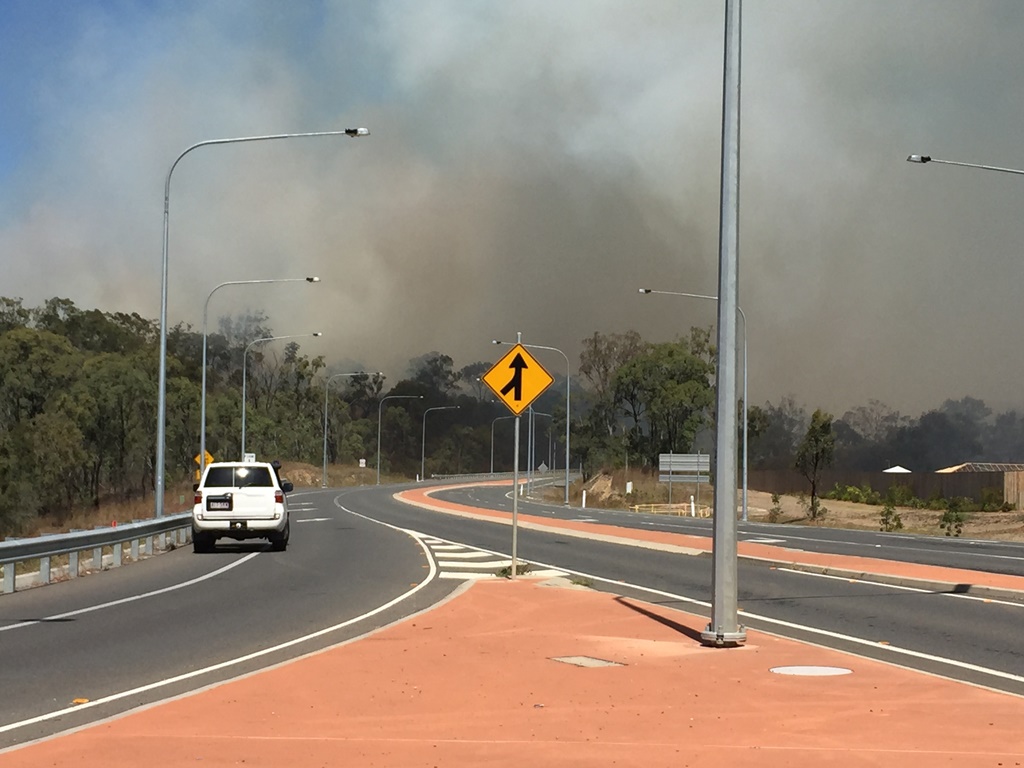 A fire is burning behind Daly Rd at Glen Eden. A fire is burning behind Daly Rd at Glen Eden.