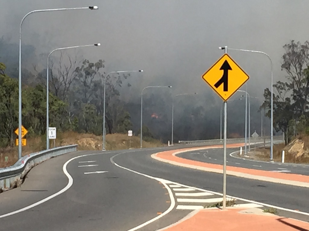 A fire is burning behind Daly Rd at Glen Eden. A fire is burning behind Daly Rd at Glen Eden.