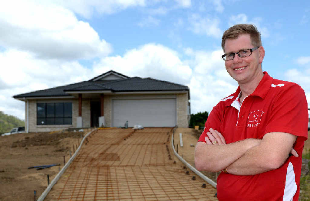 ON A ROLL: CJ Home’s sales consultant Steven O’Hanlon doesn’t agree with others that the building industry is suffering, with CJ Homes building a record number of homes this year. ON A ROLL: CJ Home’s sales consultant Steven O’Hanlon doesn’t agree with others that the building industry is suffering, with CJ Homes building a record number of homes this year.