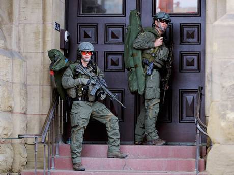 Armed RCMP officers guard the front of Langevin Block on Parliament Hilll following a shooting incident in Ottawa Armed RCMP officers guard the front of Langevin Block on Parliament Hilll following a shooting incident in Ottawa