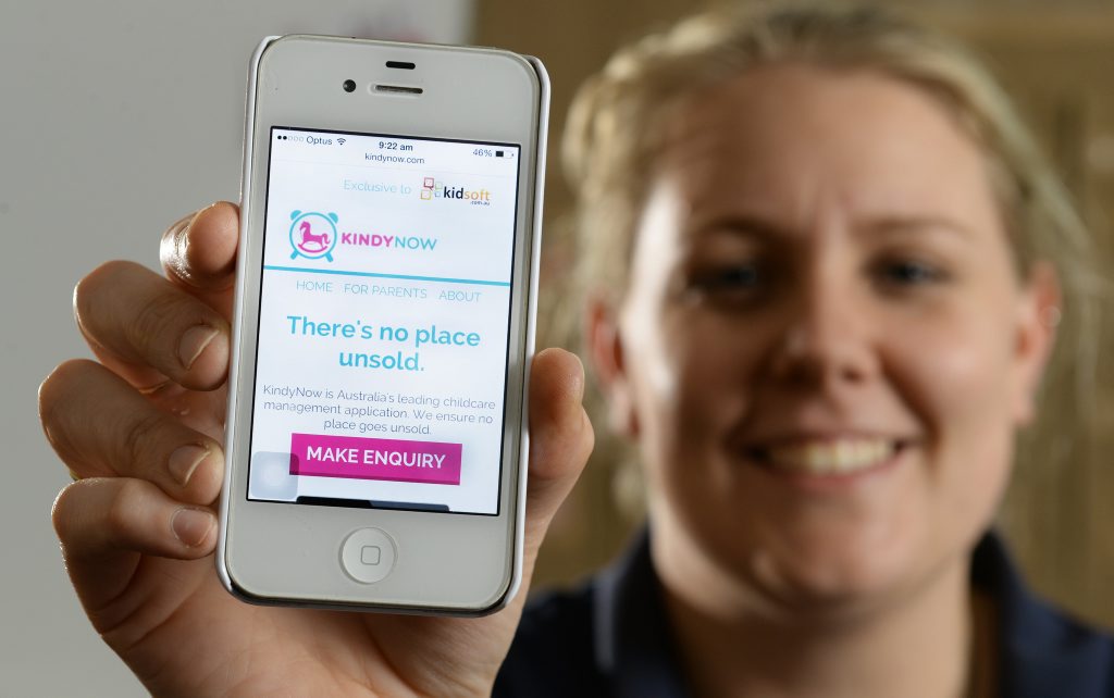 SO CONVENIENT: Kasey Trevor with the newly launched KindyNow app, which allows parents and staff at Kindy Patch West Ipswich to keep track of available spaces at the centre. SO CONVENIENT: Kasey Trevor with the newly launched KindyNow app, which allows parents and staff at Kindy Patch West Ipswich to keep track of available spaces at the centre.