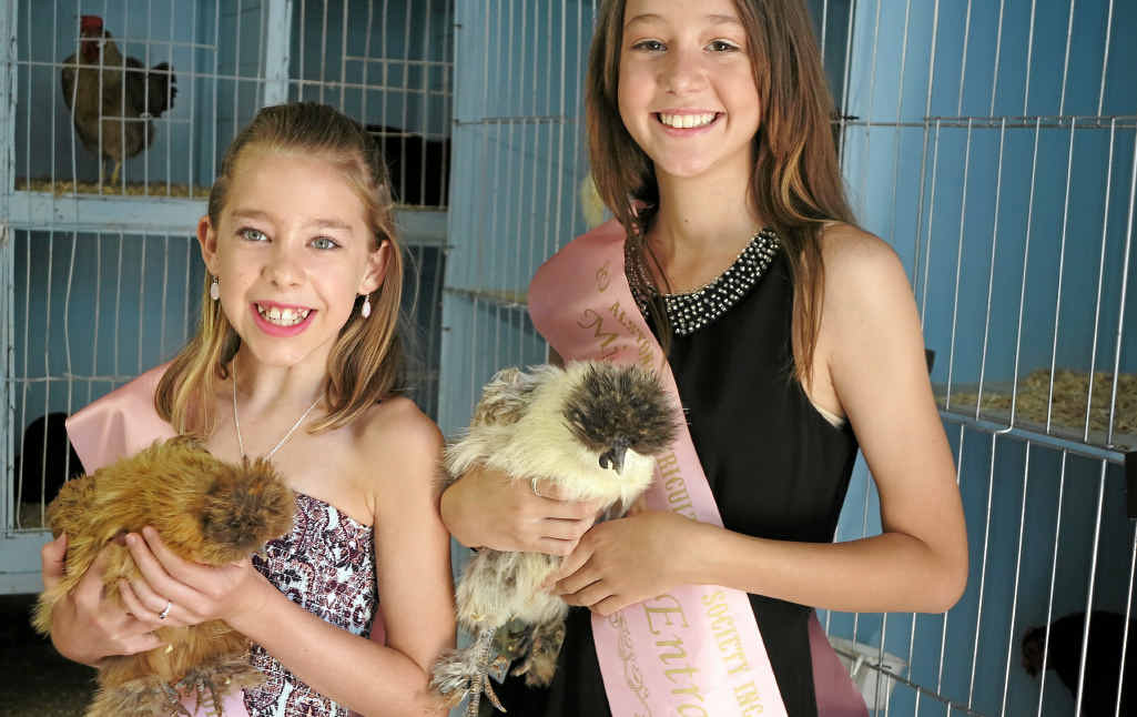 Two young girls enjoying the Alstonville Show last year. Two young girls enjoying the Alstonville Show last year.