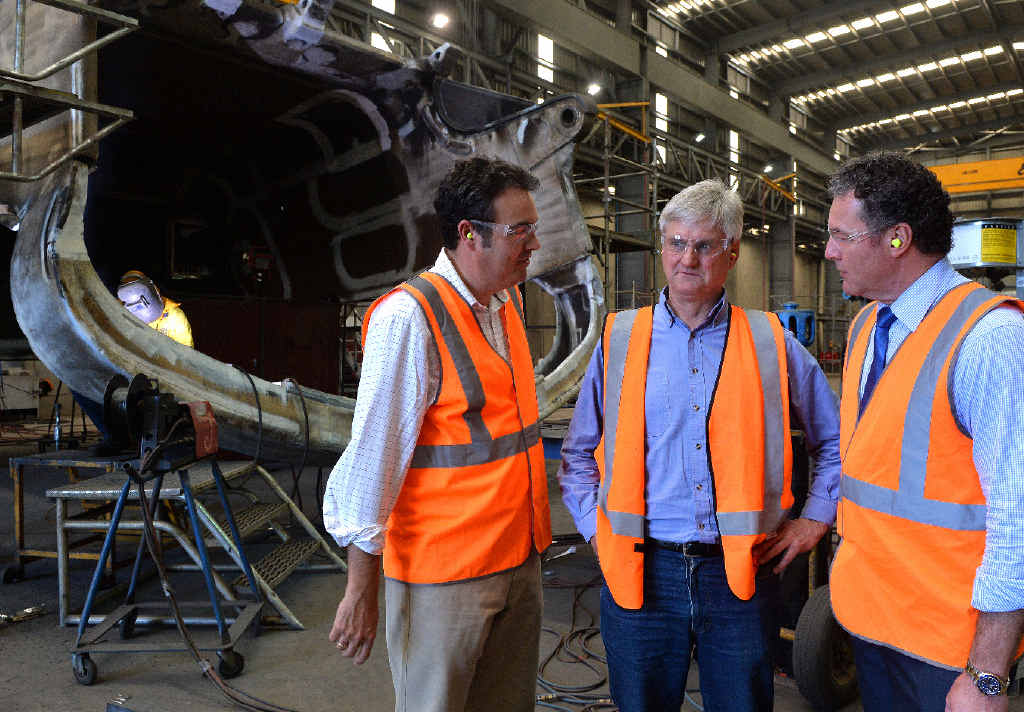 MORE APPRENTICES: Whitsunday’s MP Jason Costigan, Melco Engineering’s Paul Hyland and Minister for Education,Training and Employment John-Paul Langbroek discuss the apprentice scheme as Michael Hermann works on a dragline bucket at the rear. MORE APPRENTICES: Whitsunday’s MP Jason Costigan, Melco Engineering’s Paul Hyland and Minister for Education,Training and Employment John-Paul Langbroek discuss the apprentice scheme as Michael Hermann works on a dragline bucket at the rear.