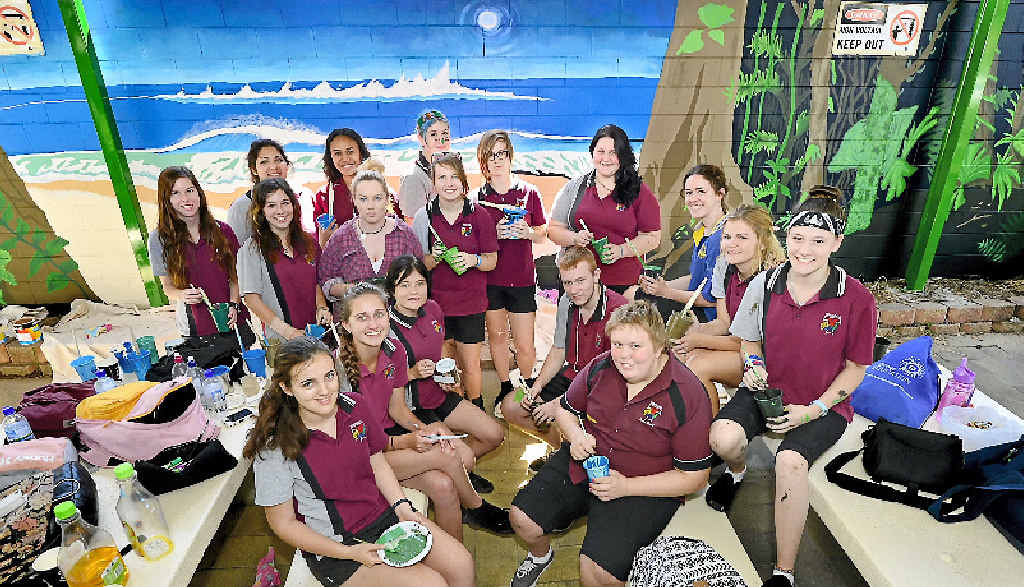CREATIVE VIBES: Toolooa State High School students painted a beach-meets-jungle mural at the CQUniversity Martin Hanson Building. CREATIVE VIBES: Toolooa State High School students painted a beach-meets-jungle mural at the CQUniversity Martin Hanson Building.
