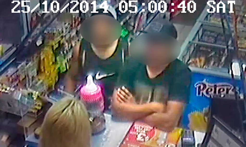 The two men with the pink jar of charity money that they allegedly stole. The two men with the pink jar of charity money that they allegedly stole.