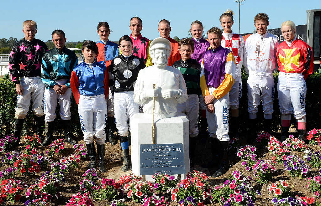NEVER FORGOTTEN: Gympie Cup jockeys (back, from left) Shaun Bayliss, Matthew Gray, Kelly Gates, Chris Kearney, Jason Missan, Alisha Taylor, Amy Van Der Sanden, Taylor Williams and Anthony Meritt, (middle) Billie-Rose Derbyshire, Sarah Eilbeck, Jason Hoopert and Ian Coombes stand beside the memorial of their fallen friend Desiree Gill. It was a sombre day at the Gympie track as everyone remembered the champion bush jockey. NEVER FORGOTTEN: Gympie Cup jockeys (back, from left) Shaun Bayliss, Matthew Gray, Kelly Gates, Chris Kearney, Jason Missan, Alisha Taylor, Amy Van Der Sanden, Taylor Williams and Anthony Meritt, (middle) Billie-Rose Derbyshire, Sarah Eilbeck, Jason Hoopert and Ian Coombes stand beside the memorial of their fallen friend Desiree Gill. It was a sombre day at the Gympie track as everyone remembered the champion bush jockey.