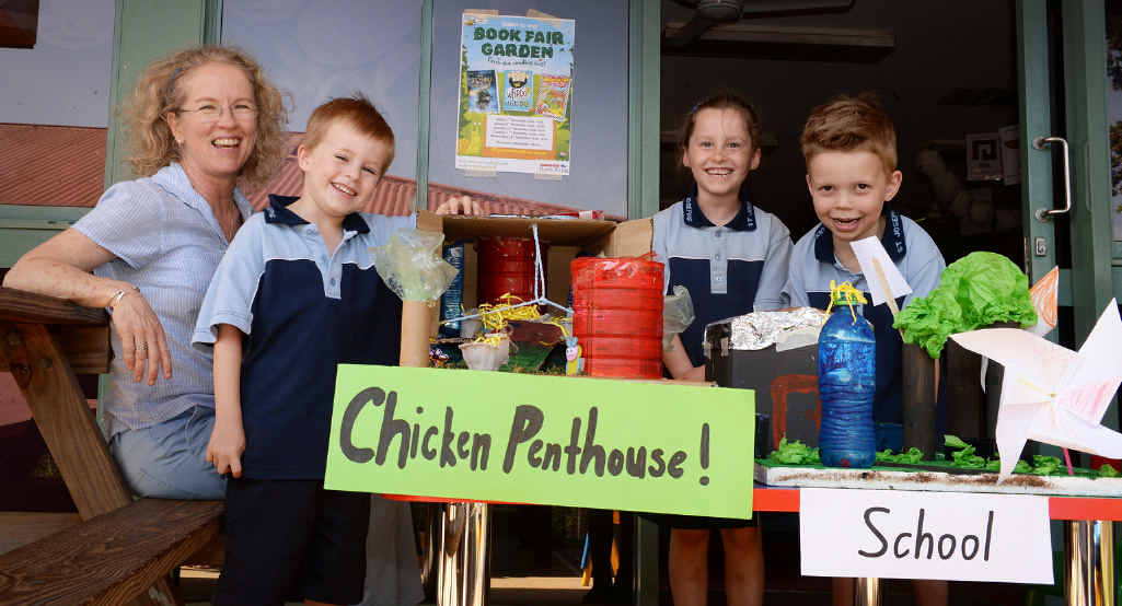 SUSTAINABILITY: St Joseph’s Primary School teacher Nikki Wagner with (from left) Cohen Ducan, Layla Davidson and Heath Tyler. In front is the Chicken Penthouse and a school model, created with the help of SCU mentors. SUSTAINABILITY: St Joseph’s Primary School teacher Nikki Wagner with (from left) Cohen Ducan, Layla Davidson and Heath Tyler. In front is the Chicken Penthouse and a school model, created with the help of SCU mentors.
