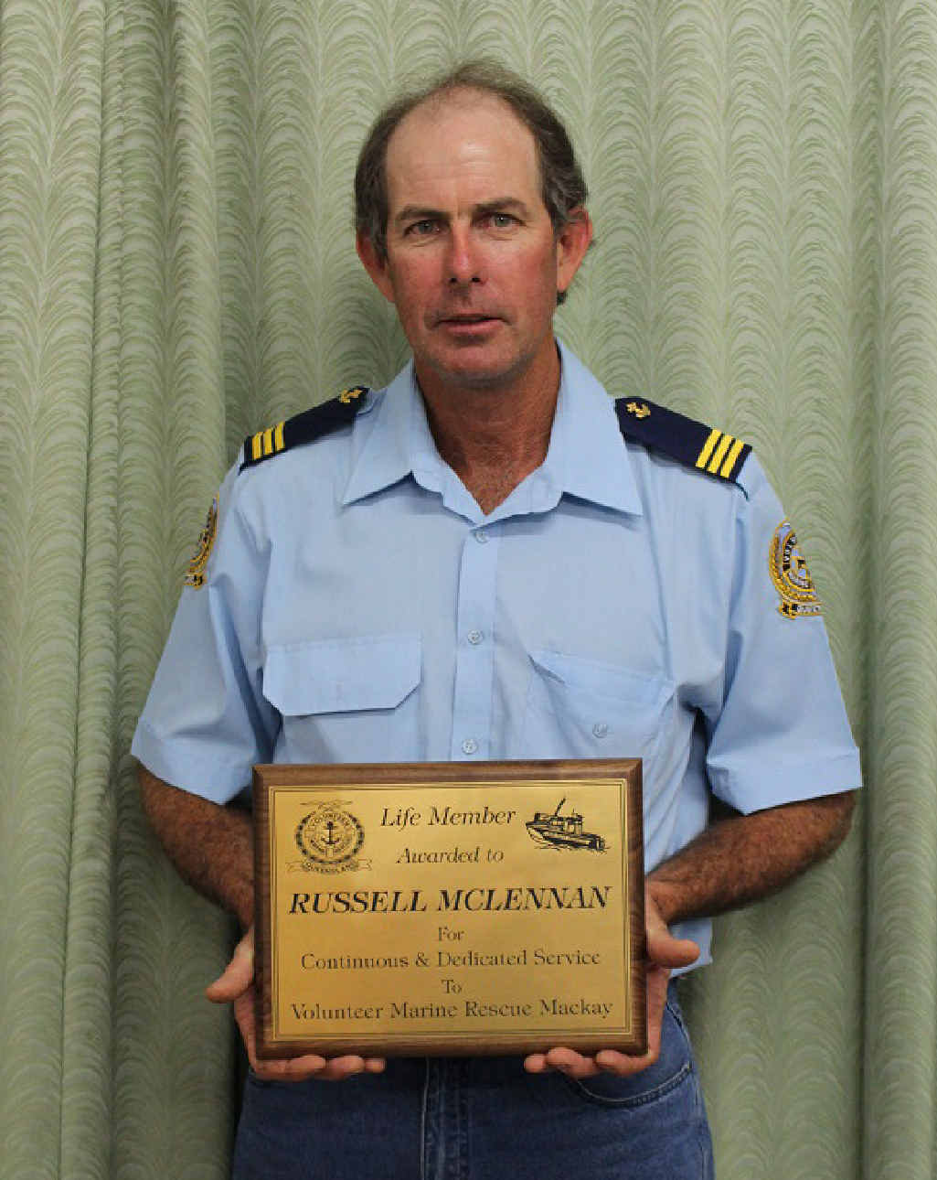 Russell McLennan has been made a life member of Volunteer Marine Rescue Mackay.