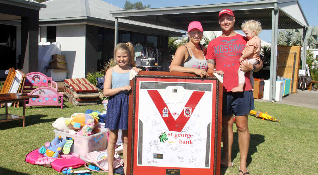 HERE TO HELP, LEFT: Kelly, Les and Bridie Bentlin, with Olivia Lowe, at their fundraising garage sale. HERE TO HELP, LEFT: Kelly, Les and Bridie Bentlin, with Olivia Lowe, at their fundraising garage sale.